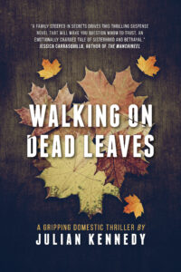 Book cover for 'Walking on Dead Leaves' featuring autumn maple leaves on a dark textured background with the author Julia Kennedy’s name at the bottom.